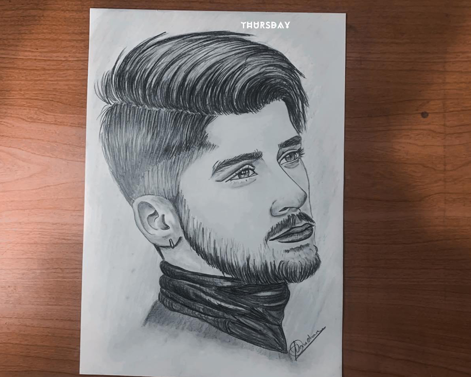 I will draw realistic pencil portrait from a photo in...